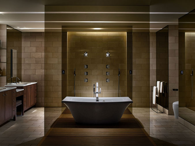 Free standing bathtub in dramatically lighted bathroom